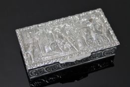 A Dutch silver snuff box, cast in relief with figures in a rural setting,