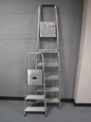 Two sets of metal folding steps