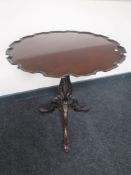 A mahogany pie crust edge,