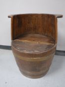 An oak coopered barrel armchair