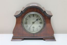 A mahogany cased mantel clock with silvered dial signed Prestons,
