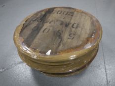 Eight oak whiskey barrel lids