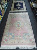 Two fringed Chinese rugs