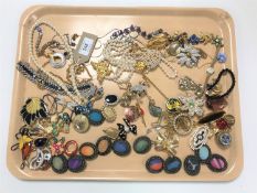 A collection of costume jewellery, brooches,