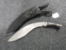 A kukri in leather sheath