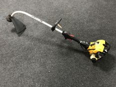 A JCB petrol strimmer