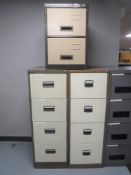 Two metal four drawer filing cabinets and a two drawer cabinet