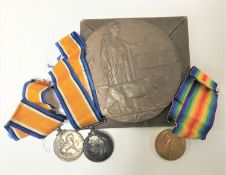 A First World War family group of three medals,