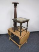 An oak flap sided coffee table,