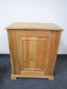 An antique pine cupboard