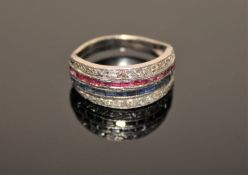 A diamond, sapphire and ruby half eternity ring,