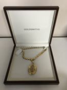 A diamond and seed pearl set yellow metal locket,