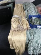 A pair of fully lined curtains with tie backs and swag,