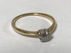 An 18ct gold old cut solitaire diamond ring