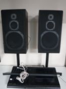 A Grundig Studio Line hi/fi system and a pair of Aiwa speakers on stands