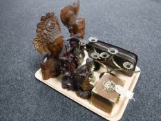 A tray of carved Eastern figures, brass figures, pair of candelabra,