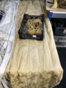 A pair of gold floral fully lined curtains, drop 280 cm,