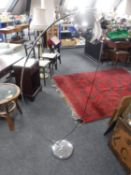 A contemporary chrome angle poised lamp