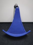 An Ikea rattan garden swing seat