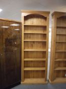 A large set of pine open bookshelves