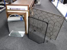 A four piece wrought iron companion set on stand,