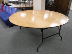 Two large circular folding banquet tables