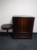 A Regency style TV cabinet and a pedestal table