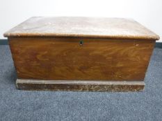 An antique pine blanket chest