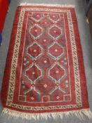 An Eastern rug on red ground