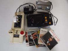 A crate containing View master with viewing cards,