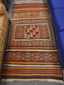 An Eastern rug on red ground