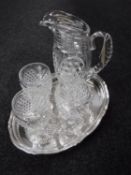 A plated serving tray and three Webb Crystal goblets and jug
