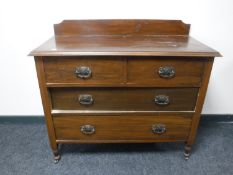 An Edwardian four drawer chest