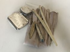 A silver cigarette case together with a Victorian atomiser, leather gloves,