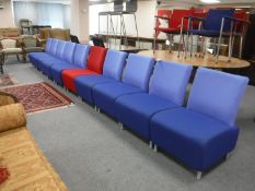 Ten reception chairs (nine blue and one red)