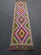 A Suzni kilim runner,