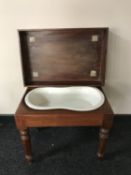 A Victorian mahogany bath table with liner