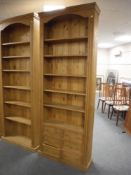 A large set of pine open bookshelves fitted six drawers CONDITION REPORT: 221cm