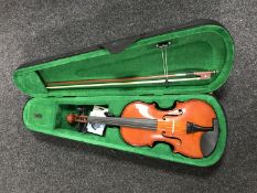 A cased Windsor violin and bow