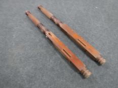 A pair of Victorian carved mahogany bed supports