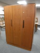 A teak G Plan triple door wardrobe
