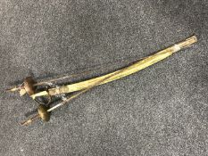 An Indian sword in scabbard and two fencing foils