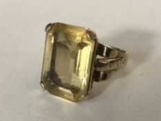 A 9ct gold citrine ring, size P, 6.8g.