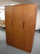 A teak G Plan triple door wardrobe