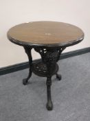 A circular Britannia pub table