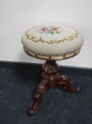 A Victorian mahogany tapestry upholstered tripod stool CONDITION REPORT: Section