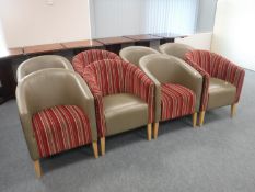 A set of eight leather and cloth tub chairs