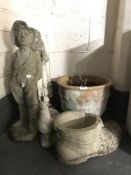 Two garden figures - boy and girl, a garden boot planter,