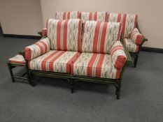 A bamboo and wicker three seater and two seater settees with matching footstool