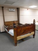 A Victorian mahogany half tester bed with interior
